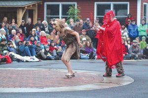 Once again the Solstice Pageant offered by Good Harbor Hill Players delighted a huge crowd. This year’s theme took the audience through a year in a caveman’s life. Above: In February, cupid (Buddy Skinner) shot an arrow at a lovely cave lady and dancing ensued! Above right: Cavemen danced the year away to the music of GAMEPALAJ. Right: At first the cavemen thought the little dancing snowmen were cute. But as they grew, art imitated life and the population grew tired of winter. Finally, the cavemen joined forces and toppled the snowman, making way for the appearance of the Sun King!