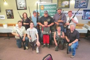 The Arrowhead Chapter of the Minnesota Deer Hunters Association held its annual banquet June 18, 2013 at the American Legion in Grand Marais. Winners of the raffle, shown with their prizes, are (L-R, front) Randy Spry, Colton Furlong, Cole Anderson, Wendy Ford, Thomas Whitney. (L-R, back) Kathy Shaffer, Floyd Bertelsen, Kyle Anderson, Matt Ziller, Tyson Cronberg.