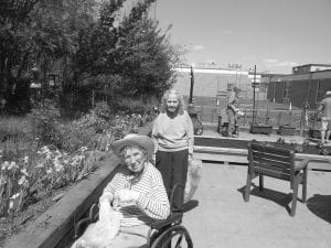 Irma Larsen and Trudy Boyd enjoyed weeding and planting flowers at the North Shore Care Center on one of the rare sunny days in June. The flowers are looking great on the patios and residents are getting outdoors whenever they can!