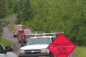 Traffic was halted for about half an hour on the Gunflint Trail on Wednesday, June 26, 2013 as the Gunflint Trail Fire Department extinguished a vehicle fire. The Gunflint Trail Fire Department was paged to the fire at 3:34 p.m. at 10030 Gunflint Trail, near Loon Lake. The fire department was on scene by 3:45 p.m. and called for foam to combat the fire. The fire was considered contained by 5:01 p.m. and the fire department was clear of the scene by 5:05 p.m. The fire appeared to have started because of a problem with the battery.