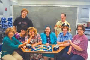 Above: The Odd Couple (female version) debuts July 19. The cast in this hilarious production is (L-R, seated) Gerry Grant, Yvonne Block, Kerri Bilben, Erin Larsen, Jane Gellner and Julie Fredlund. (Standing in back) Jack Nickolay and Jason Winters. Left: Storytellers Rose Arrowsmith DeCoux and Jennifer Rudick Zunikoff will be offering a storytelling workshop as part of the Playhouse Summer Theater Festival.