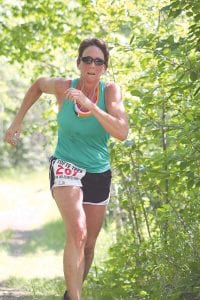 Walking fast and furious, Lisa Topp from Silver Bay placed first for women in the 10K race walk.