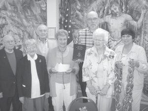 The basement of St. John’s Catholic Church was filled on Sunday morning, July 14 to help Lucille (Lu) Pettijohn celebrate her 100th birthday. A World War ll vet, Lu served five years, eight months and 3 days setting up medical bases around the U.S. to take care of injured soldiers. Although she quit driving three years ago Lu still lives on her own and attends Mass each morning. “She’s absolutely incredible,” said one person who wishes to remain anonymous. With Lu is (L-R) Dave and Flossie Palmer, Bob Pye, Skip Joynes, Ken Wielinski, Lu and Charlotte Maciejewski.