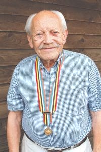 Warren Anderson of Grand Marais traveled to South Korea in May 2013 with other Korean War veterans to see the once war-torn country. Anderson was pleased to see modern-day Korea, noting that the people seem healthy and happy. Anderson was presented with this peace medal at a banquet overseen by South Korean President Park Geun-hye. Anderson was overwhelmed by the gratitude of the Korean people.