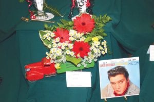 Skip Joynes’ arrangement featuring Howdy Doody (left) definitely fit into the '50s theme at the Grand Marais Garden Club show, as did this vintage truckload of blooms (above) arranged by Skip’s grandson Aaron Carlson.