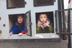 The Cook County Dog Mushers didn’t bring any sled dogs to the parade of teams. However, they made good use of the dog boxes in their mushing truck. These young men were very wellbehaved puppies.