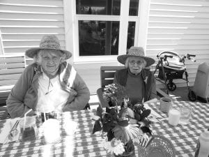 Folks at the North Shore Care Center are getting outdoors to catch the sun whenever they can. The Joynes Sisters - Donna Willett and Irma Toftey—enjoy a picnic on the patio.