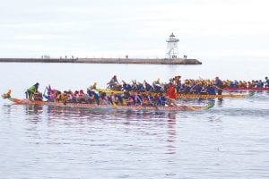 The North Shore Dragon Boat Festival Friday - Saturday, July 26-27, 2013 was another rousing success. The waterfront was packed with people watching the racing action. In the final heat were (from foreground) Team Canada, Quetico-Superior and Wiki & Da Boys. See more Dragon Boat news on page A3.