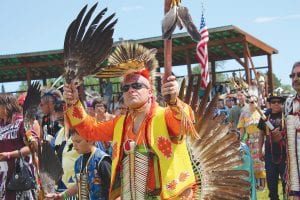 This dancer was one of over 500 who entered in the afternoon Grand Entry at the Grand Portage Rendezvous Days Powwow on Saturday, August 10. There were even more dancers in the evening Grand Entry. The Grand Portage host drum Stonebridge Singers sang for a full 18 minutes as 800 dancers entered the powwow circle. The day included many special honor songs and healing songs and in the evening an exciting round dance. There were also many events through the weekend at the voyageur encampment at the Grand Portage National Monument. See more about the 2013 Rendezvous Days celebration in Grand Portage on page B7.