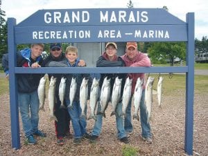 Alec, Erick, and Ryan Kemp with Tate and Troy Purcell and their catch of trout and salmon. Five salmon were over 5 pounds each. They were fishing with Captain Jerry Skarupa aboard Secret Lures on Sunday, Aug. 11.