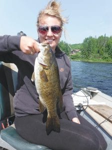 Kristen Hudson of Maple Grove, Minn.caught this very nice 18.5-inch smallmouth bass while fishing with Joe Carlson of Joe’s Inland Fishing in July.