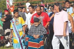 During the Grand Entry on Saturday, an eagle circled overhead—an especially meaningful sight for veterans like Johnny Mitchell. Mitchell was honored with a special drum song that came to his brother when he was fighting in Germany in World War II. It is shared each year at the Grand Portage Powwow. Mitchell’s family and community members thanked him for his service.