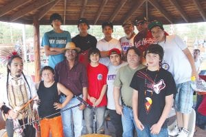 There were 29 drum groups at the Grand Portage Rendezvous Days Powwow, overseen by arena director Brandon Dahl. Host drum was the Stonebridge Singers, pictured here along with some friends. The dedicated young men are now mentoring another group, the Hollow Rock Creek Singers.