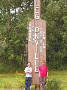 Noah Furcht (left) and Sam Sietsema attended Legionville on Sunday, July 21- Friday, July 26, learning skills they will put to use as school crossing guards at School District 166 this year. In addition to being instructed by Minnesota State Patrol officers in first aid and crossing guard procedures, the boys took part in traditional camp activities.