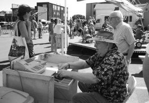 Many volunteers helped out at the Kiddy Rides during the Fisherman’s Picnic, benefiting the senior center. Pictured here manning the ticket booth are Tom Hedstrom and Warren Anderson.