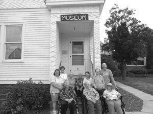 North Shore Care Center residents enjoyed a recent visit to the Cook County Historical Society Lighthouse Keepers Museum. It was a beautiful day to sit on the deck, eat World’s Best Donuts with coffee, and appreciate the great view. Carrie McHugh presented several new documentaries about local historic areas, which everyone is still talking about. (L-R, front) Janet Morgan, Eleanor Matsis, and Joyce Kehoe. (L-R, back) Nora Bockovich, Phyllis Parker, Marie Jacobsen, Skip Rouser, Kay Rosenthal, Marigold Linnell, and Belinda Hudler.