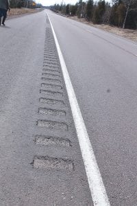 Rumble strips have been installed on the outside lane of Highway 61 for some time now—like these in the Lutsen area. The Minnesota Department of Transportation is now beginning to install the strips on the center line in an effort to decrease the incidents of head-on collisions.