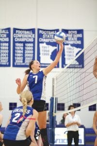 With Jessica Berg-Collman looking on, Linden Sutton went up high and tapped a ball over the front line of Esko, whom the Vikings played early last week.