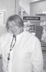 The North Shore Hospital laboratory staff is holding an Open House at the Cook County Community Center on September 29 to recognize Gine Meissner’s retirement after 32 years in the lab.