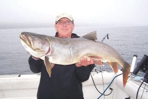 John Laurich from Sartell, Minn.caught this massive 27-pound, 43-inch lake trout on September 18 while fishing with Captain Darren Peck of Tofte Charters. The big trout made a new record for Tofte Charters. It was released back into the cold waters of Lake Superior, perhaps to be caught again someday.