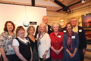 The current board of the Cook County Community Fund was happy to see such a good turnout at the 10th anniversary celebration of its partnership with the Duluth Superior Area Community Foundation. (L-R) Amber Pratt, Sue Riley, Ann Possis, Ruthanne Vos, Howard Hedstrom, Mary Petz, Richard Anderson, Tracy Benson, and Mike Carlson. Left: Community Fund Chair Howard Hedstrom made everyone feel welcome. Above: Former Chair Leigh Mathison, who is still a staunch supporter of the Community Fund, visits with Holly Sampson of the Duluth Superior Area Community Foundation.