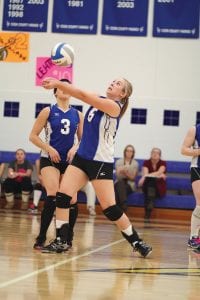 While Breanna Peterson looked on, Jamie Sjogren made a great play on this ball to save the point for the Vikings in their tough match against the Silver Bay Mariners.