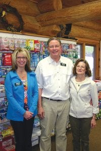 The Grand Marais Pharmacy is in the process of expanding their building, adding a hair salon in the new space below and adding more space for pharmaceutical products on the main floor. Marcy Olsen (left) and owners Bob and Elaine Sample ask the public to come in and check out the pharmacy and its services.