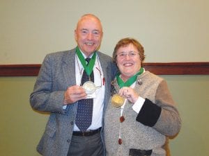 Bruce and Sue Kerfoot, the most recent inductees to the Minnesota Resort & Campground Association Hospitality Hall of Fame, show the medals they received during the association’s fall conference in Nisswa on October 22.