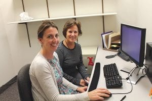 Rachelle Christianson (left) and Suzanne Davies are just getting settled in their new space at Sawtooth Mountain Clinic. But they are already quite knowledgeable about MNsure, Minnesota’s health care marketplace, and they are eager to help clients navigate the system.