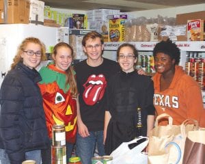 The Cook County High School members of the National Honor Society once again spent Halloween night going door to door trick-ortreating, not for candy, but for donations to the Cook County Food Shelf. This Halloween, the honor society students set a record, collecting over 660 pounds of donations. NHS juniors and friends were (L-R) Aubry Lewis, Libby Zafft, Andrew Thompson, Brenna Hay, and Elizabeth O’Phelan. Also taking part were Audrey Summers, Anna Deschampe, Anna Carman and Megan Lehto.