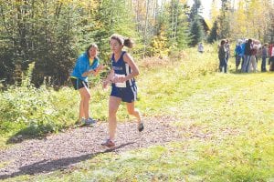 With Head Coach April Wahlstrom cheering her on, Audrey Summers pushed her pace in the recent conference meet held at Pincushion Mountain. Summers earned All-Conference honors for her great season, and just missed going to state by 8 seconds.