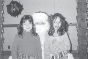 As holiday craft fairs begin around the county, we thought it might be fun to take a look at the North Country Creations Christmas Craft Fair at the Schroeder Town Hall, circa 2001. Little Lehua Sorensen and Zoe Holthaus visited with Santa at the craft fair.