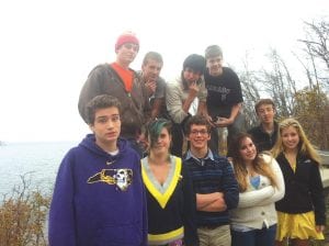 The junior varsity Knowledge Bowl team has had a spectacular season. The scholarly competitors are (L-R, front) Pete Summers, Julia Larsen, Will Seaton, Erica Weisberg, Morgan Weyrens-Welch, Sean MacDonell (behind). (L-R, back) Jaret Baker, Andrew Lashinski, Jared Spry, Lucas Phillips.