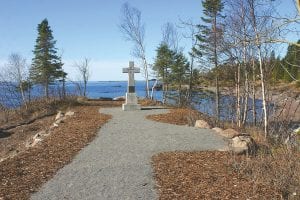 The current cross commemorating Father Baragathesehasads.welcomedIf you havevisitors to the Lake Superior shoreline near Cross River inquestions,Schroederpleasesincecall1932. The site has been a town park since 1976. The crossMNAwas movedat 800/slightly279- in 2012 and erosion control measures were installed,2979.as wellThankas you.a handicap accessible path to the historic cross. The township is considering other improvements to the site.