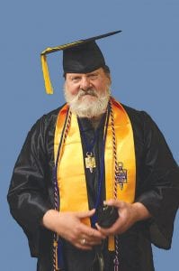 Gunflint Trail resident Dewey Pihlman at his May 20, 2013 graduation from Lake Superior College.