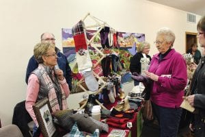 Mittens make the perfect holiday gift. Gail England was one of the many talented crafters at the Community Center Christmas Craft Show.