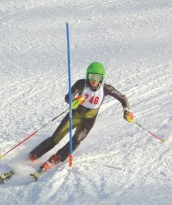 The Cook County/Silver Bay Alpine Vikings had a stellar start to the season on Friday, December 13. Left: Going out of the gate, 9th grader Damian Zimmer proved he has what it takes battling boot-deep ruts finishing 18th. Top: Seventh-grader and four-sport athlete Reilly Wahlers (middle) woke up Section 7A throwing down two excellent runs winning 3rd place overall. Pictured with Reilly are Hermantown racer McKenzie Bremel (1st) and CEC’s Sarah Severson (2nd). Above: Ninth-grader Will Lamb (left) skied two fast runs winning second place. He is pictured here on the podium with Duluth East racer Alex Bianchi (1st) and Hermantown’s Matt Borash (3rd).