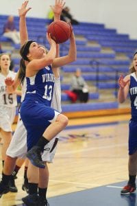 Senior guard Breana Peterson scored 2 points on this lay-up against Two Harbors. For the night Peterson scored 20 points and played a great game on defense.