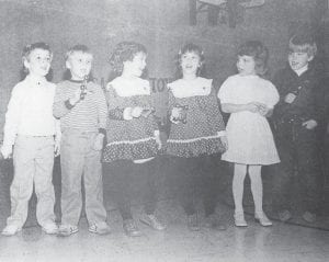 Kindergartners sang out their Christmas cheer in this Dec. 22, 1983 News-Herald photo taken at the Birch Grove Christmas Program. Ringing their bells to “Jingle Bells” are, from left, Chris Bjerkness, John Dostal, Stacey Johnson, Cody Johnson, Sarah High and Brian Jordan. They were the first choral group to perform. Jean Renneberg, instructor, was the coordinator for the program which also featured Sandra Schinn as Santa Claus and a performance entitled The North Pole Goes Rock ‘N Roll.