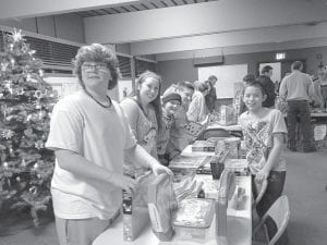 The Bethlehem Lutheran Church confirmation students had a great time serving as Santa’s helpers during this year’s Operation Family Christmas gift distribution. Because of many community volunteers and donors, the holidays were happier for 25 Cook County families.