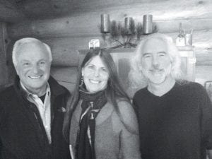 Michael Monroe and Deb Mueller open their Pike Lake home for intimate concerts in their log cabin concert series. This unique venue will be featured in an upcoming On the Road program. Mueller and Monroe are pictured here with On the Road host Jason Davis (left).