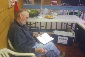 The Grand Marais Swimming Pool was closed for good on Tuesday, December 31. A commemorative “Last Splash” party was held Friday, December 27, with several hundred people attending. Above: Art Kidd, like a great many people, shared his memories about what the pool has meant to him over the years.