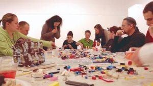 Participants in a recent Moving Matters “Planning Thru Play Potluck” at the Grand Marais Art Colony consider what a walkable/bikeable community would look like.