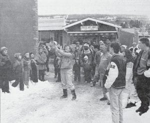 Dr. Sandy Stover catches a herring during one of the many fun events in Grand Marais at the “Dog Days II” Winter Carnival organized by the Grand Marais Chamber of Commerce Jan. 17-20, 1991 in conjunction with the Beargrease 500 Sled Dog Race. The carnival featured sled dogs, broomball, fish toss, raffles and snow sculptures. The Chamber advertised the event seen above as the “World Championship Winter Fish Toss” which was brought back by “popular demand from the Fisherman’s Picnic.” It is unknown who won the event, which, judging from the photo, was one of the more popular events of the weekend.