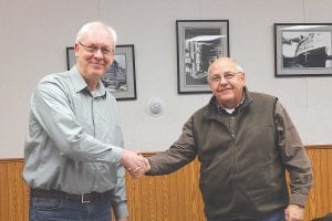 Cook County – Grand Marais Economic Development Authority Board President Mark Sandbo (right) welcomes new EDA Board Member Howard Hedstrom at the January 14, 2014 EDA meeting.