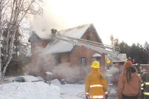 Three fire departments—Grand Marais, Maple Hill and Lutsen—responded to a fire in Grand Marais on Tuesday, January 21. The home suffered significant smoke and water damage, but the residents and their two cats and some fish were uninjured.