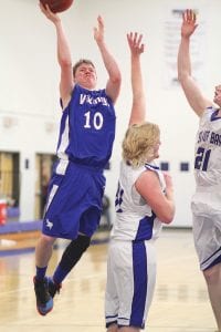 Richie Furlong went hard to basket and scored two of the ten points he ended his night with in the 55-39 victory over the Silver Bay Mariners.