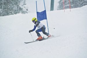 Thirty-six racers from the Lutsen Junior Alpine Club competed on Koo-Koo at Lutsen Mountains on Sunday, January 26. Above: Birthday girl Katie Peck focused on the course. Left: Weston Heeren holds his form between gates. Below left: Team veteran Lauren Thompson skis to a second place finish.