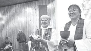 On Sunday, January 26, 2014 a joyful, but bittersweet service was held at the First Congregational - United Church of Christ in Grand Marais as the congregation bid a final farewell to Interim Minister EvaLyn Carlson (left) and welcomed Reverend Beth Benson as its new settled pastor.