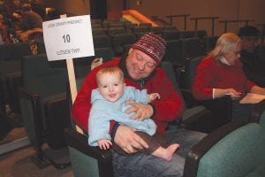 More than 30 people turned out for the Cook County DFL precinct caucuses on Tuesday, February 4, including this little fellow who enjoyed listening to the political debates with his dad. See more of the DFL caucus, as well as the Republican caucus on page A3.